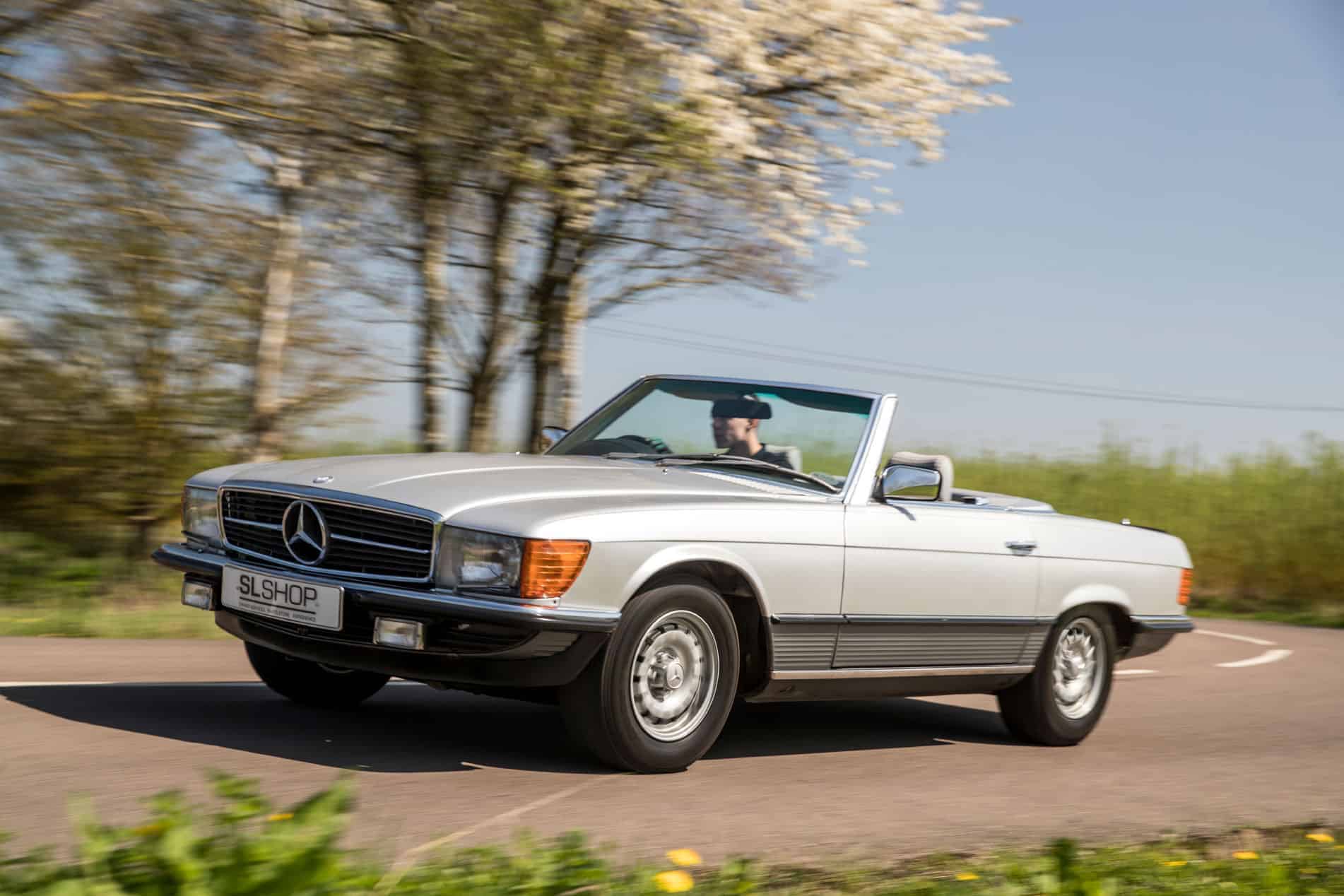 Mercedes R129 SL turning a corner.