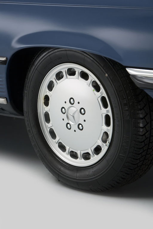 Classic 15" hole wheels characteristic of the R107 SL