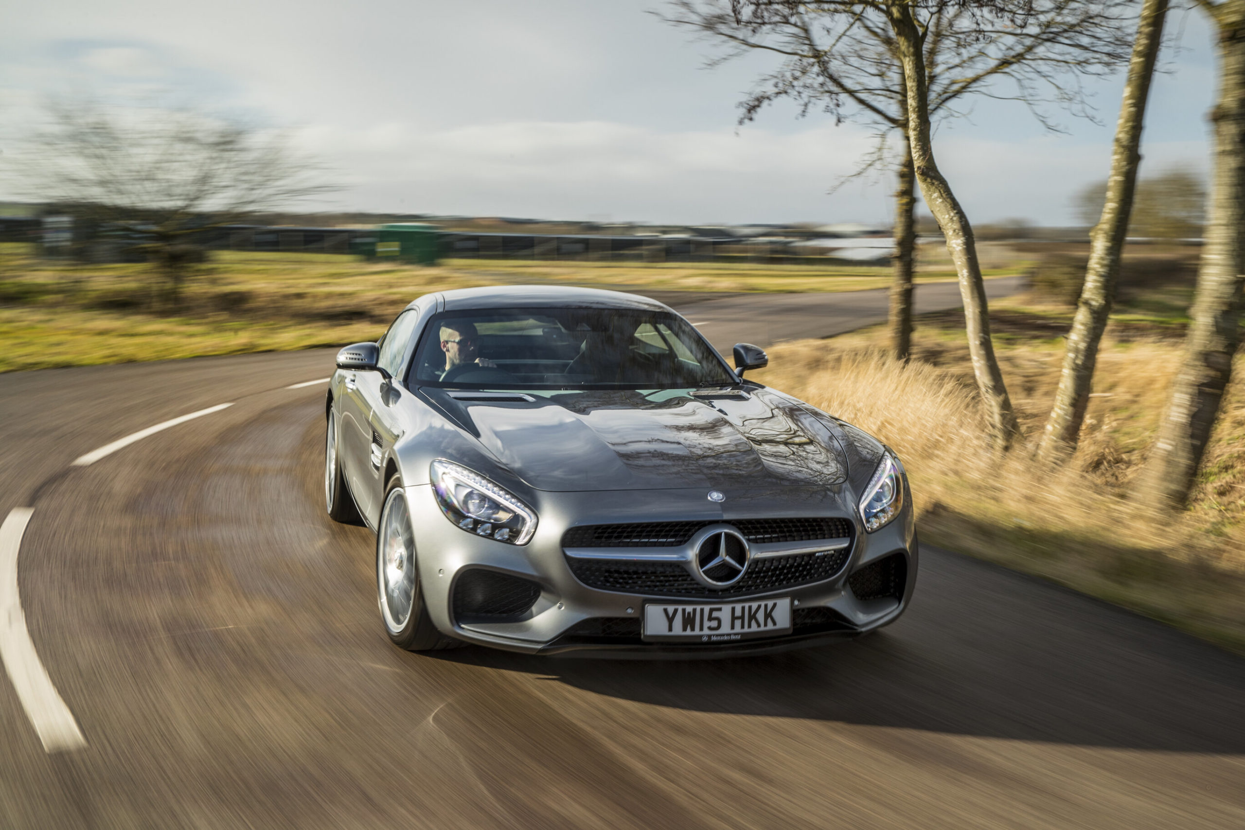 Mercedes R129 SL turning a corner.