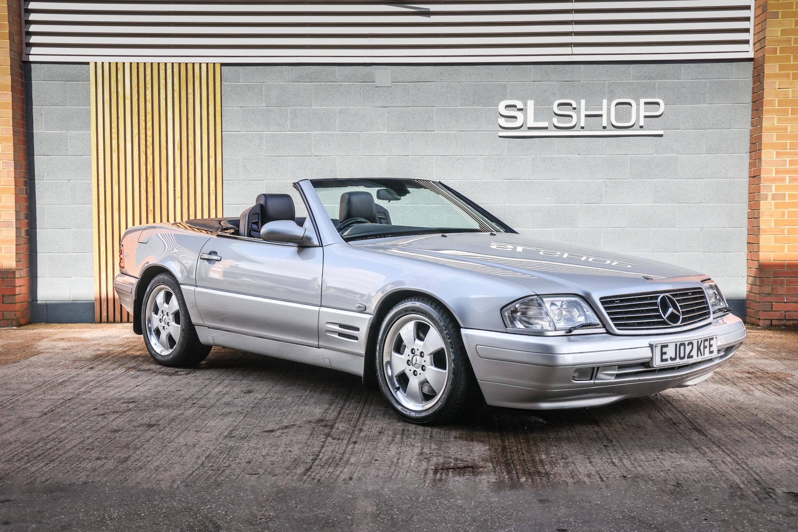 2002 Mercedes Benz R129 SL280 Brilliant Silver (744) with Blue