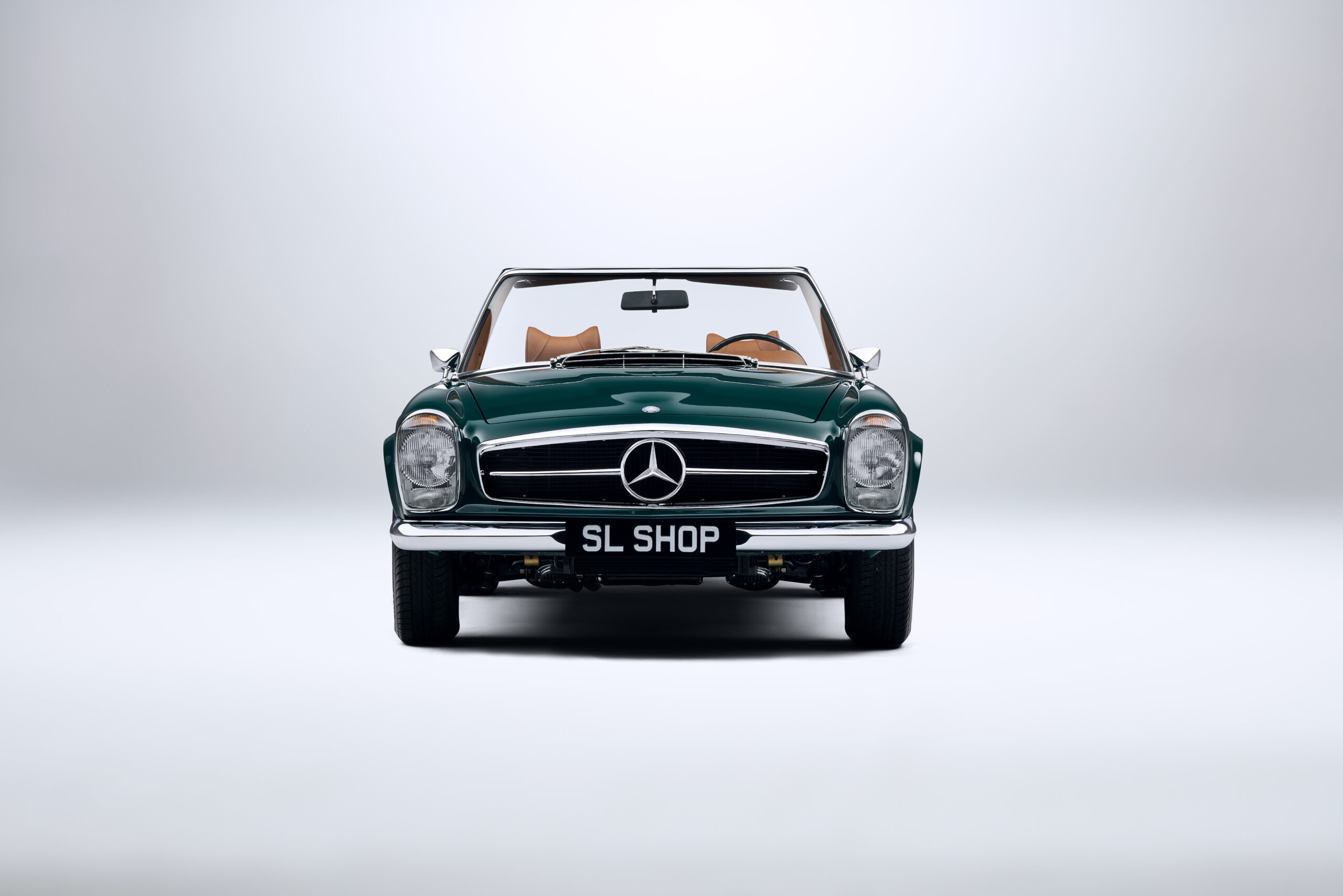 1970 Mercedes Benz W113 280SL Dark Green (268) with Cognac Leather